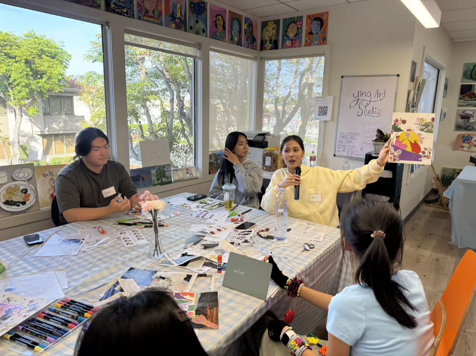 Participants working on their art pieces at YingArt Studio
